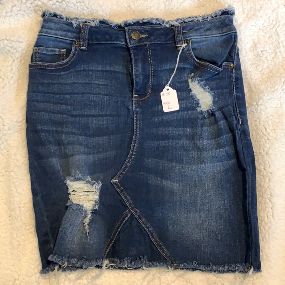 Distressed denim mini skirt